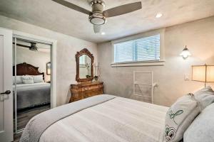 a bedroom with a large bed and a mirror at Brand new 2 bed +bonus room Grass Valley/Nevada City in Grass Valley