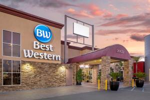 a building with a sign that reads buy the best western at Best Western Canoga Park Motor Inn in Canoga Park