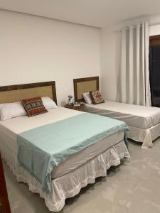 En eller flere senge i et værelse på Casa de Iyá, Barra Grande - 350m da praia