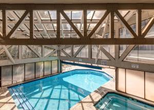 an overhead view of a swimming pool in a building at Silver King & Prime Park City Condo in Park City