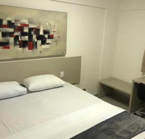 Ένα ή περισσότερα κρεβάτια σε δωμάτιο στο Evian Thermas +10 φωτογραφίες