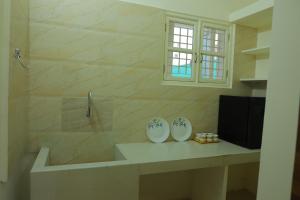 Koupelna v ubytování Padma Homes Stay- Luxury Service Apartment 1BHK & 2BHK & 3BHK