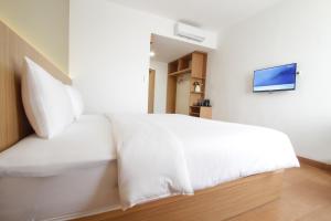 Katil atau katil-katil dalam bilik di Sepanak Hotel by Amazing +10 gambar