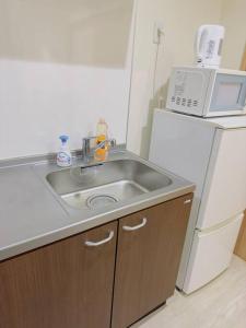 Una cocina o kitchenette en 100m from nearest bus stop/8 mins to Ikebukuro sta