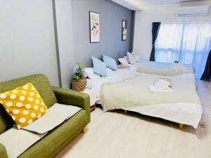 Una cama o camas en una habitación de 100m from nearest bus stop/8 mins to Ikebukuro sta