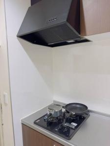 Una cocina o kitchenette en 100m from nearest bus stop/8 mins to Ikebukuro sta
