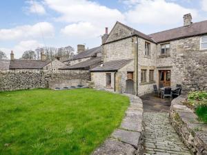 an old stone house with a large yard at 3 Bed in Hartington 54215 in Hartington