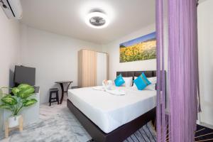 Postel nebo postele na pokoji v ubytování ฺBaan Waru seaview villa
