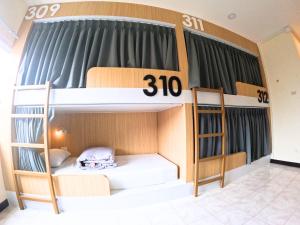 Postel nebo postele na pokoji v ubytování KPOP Hostel