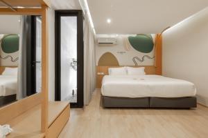 Double B Hostel客房内的一张或多张床位