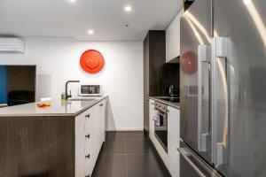 A cozinha ou cozinha compacta de Stylish 1BR Apt in a Prime Central Location