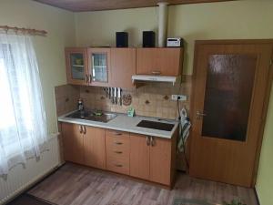 Kuchyň nebo kuchyňský kout v ubytování Pavilon v ráji