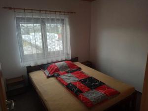 Postel nebo postele na pokoji v ubytování Pavilon v ráji