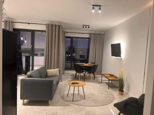 Χώρος καθιστικού στο Apartament Pendereckiego