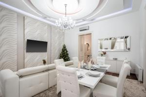 A seating area at Opera Balkony Luxury Apartment with free parking