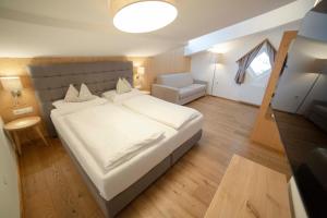 Posteľ alebo postele v izbe v ubytovaní Aparthotel Steger Wagrain + 37 fotografií