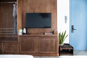 TV a/nebo společenská místnost v ubytování Velar Hotel Con Dao - Vung Tau