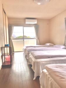 Uma cama ou camas num quarto em 花源