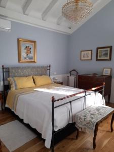 Ένα ή περισσότερα κρεβάτια σε δωμάτιο στο Casa Al Borghetto