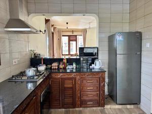 Nhà bếp/bếp nhỏ tại Executive three bedroom, Furnished