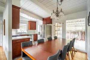 a kitchen with a dining room table and chairs at Menlo Park 4br w garage backyard patio ac SFO-1543 in Menlo Park