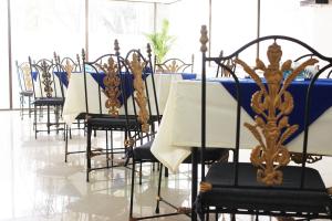 Restoran või mõni muu söögikoht majutusasutuses Hotel Metropolis Plaza Cali