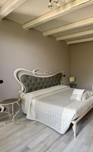 Postel nebo postele na pokoji v ubytování Casale Raffaello B&B Como