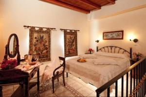 Posteľ alebo postele v izbe v ubytovaní Veneto Boutique Hotel