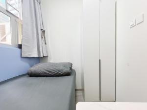Student Accommodation - 188 Wan Chai Road 객실 침대