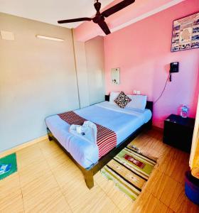 Postel nebo postele na pokoji v ubytování Hotel Donosti Pokhara