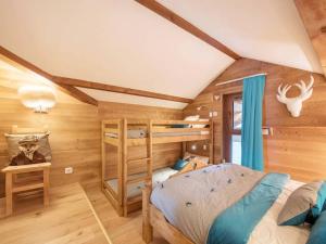 Postel nebo postele na pokoji v ubytování Duplex 75m², 8 pers. Cosy, proche pistes avec Concierge, TV Netflix et Wi-Fi - FR-1-545-5