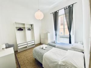 Posteľ alebo postele v izbe v ubytovaní Greci 16 II