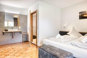 Postel nebo postele na pokoji v ubytování Appartement Aurora + 32 fotografií