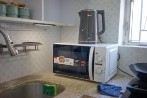 Nhà bếp/bếp nhỏ tại Student Accommodation - 290 Hennessy Road