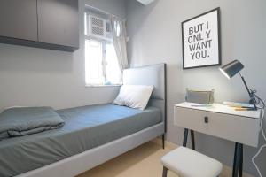 Giường trong phòng chung tại Student Accommodation - 290 Hennessy Road