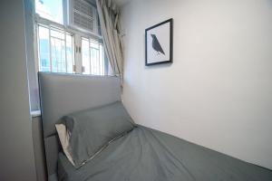 Giường trong phòng chung tại Student Accommodation - 290 Hennessy Road
