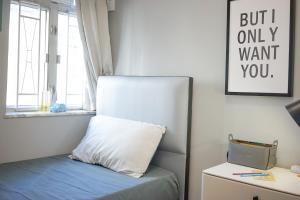 Giường trong phòng chung tại Student Accommodation - 290 Hennessy Road