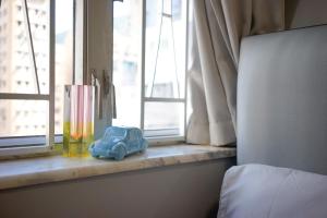 Giường trong phòng chung tại Student Accommodation - 290 Hennessy Road