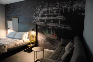 Postel nebo postele na pokoji v ubytování Alma Hotel
