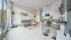 TV a/nebo společenská místnost v ubytování Apartamenty Sun & Snow Międzyzdrojski Rynek
