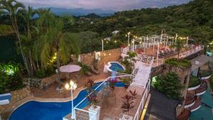 an aerial view of a pool at a resort at Blue Mirador Hotel Manuel Antonio in Manuel Antonio