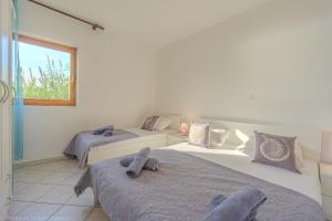 เตียงในห้องที่ Bepic Quiet location on a beautiful bay