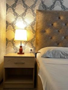 Cama ou camas em um quarto em Lalibey hotel