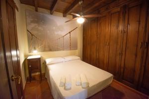 Posteľ alebo postele v izbe v ubytovaní Arco Elvira - Abarqueros Suite - Albaycin