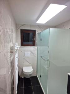 Koupelna v ubytování Ferienwohnung St. Josef + 4 fotografie