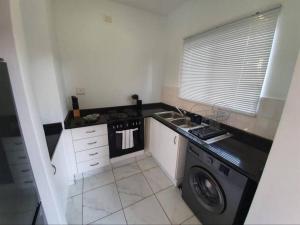 Kuchyň nebo kuchyňský kout v ubytování Sheffield Suite 4