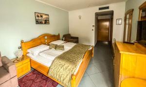Кровать или кровати в номере Hotel Miramare