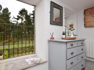 a room with a window and a dresser with a mirror at 1 Bed in Durham 76615 in Lanchester