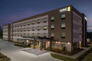 an office building with a home sign on it at Home2 Suites By Hilton Cullman in Cullman