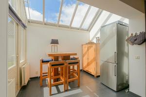 Η κουζίνα ή μικρή κουζίνα στο Villa Mooy met sauna - Landal park Ooghduyne Julianadorp aan Zee